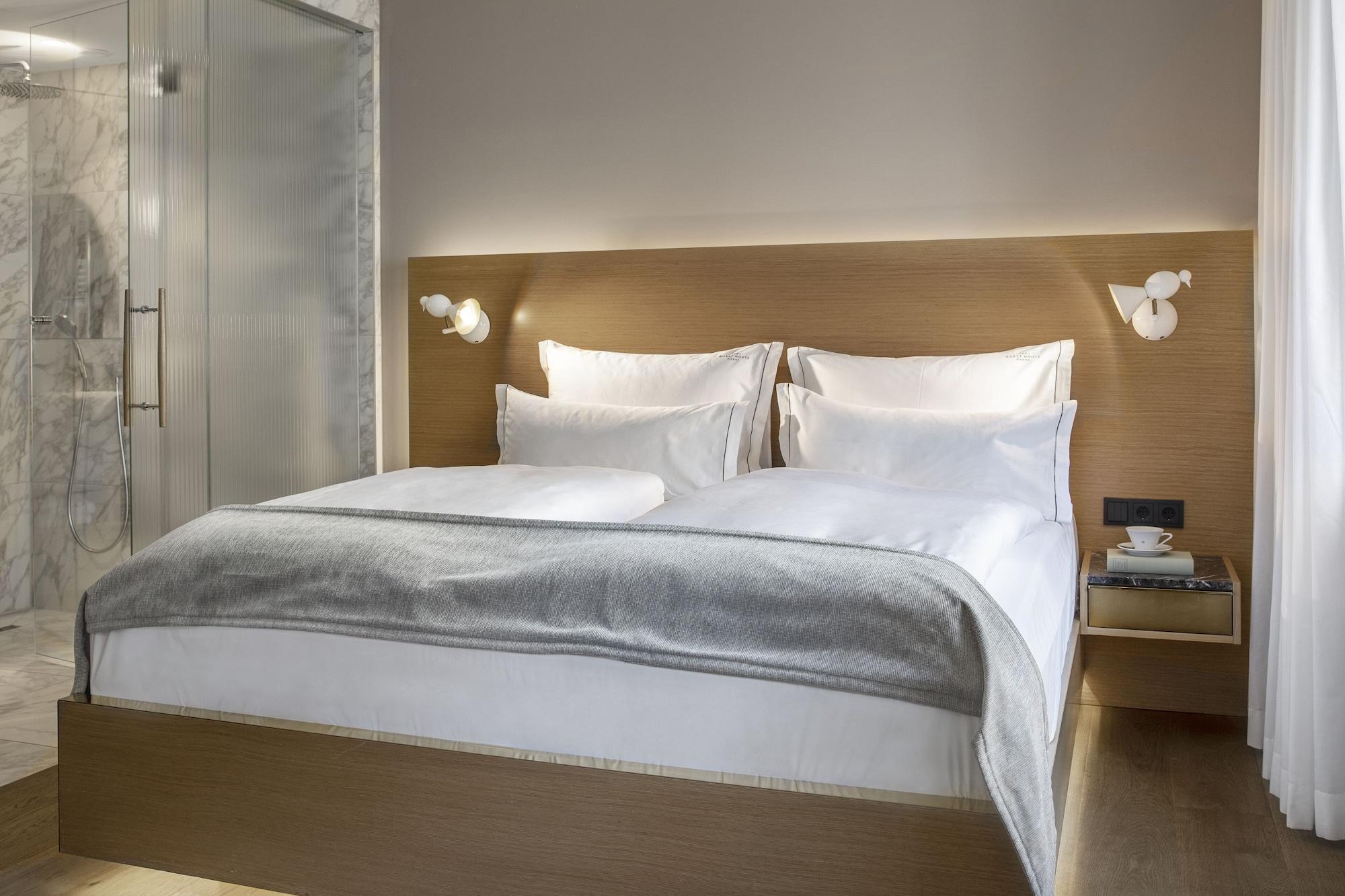 The Guesthouse Wien Eksteriør bilde A bedroom at the Mandarin Oriental Munich